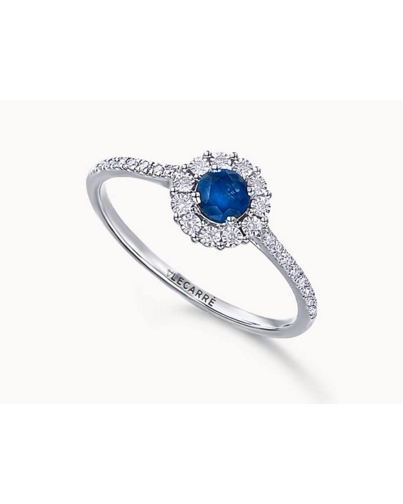 Sortija  oro blanco diamantes y zafiro azul